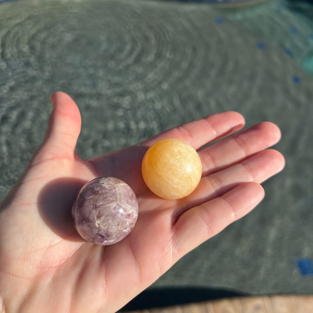 2 small spheres yellow calcite and purple amethyst crystals minerals carvings